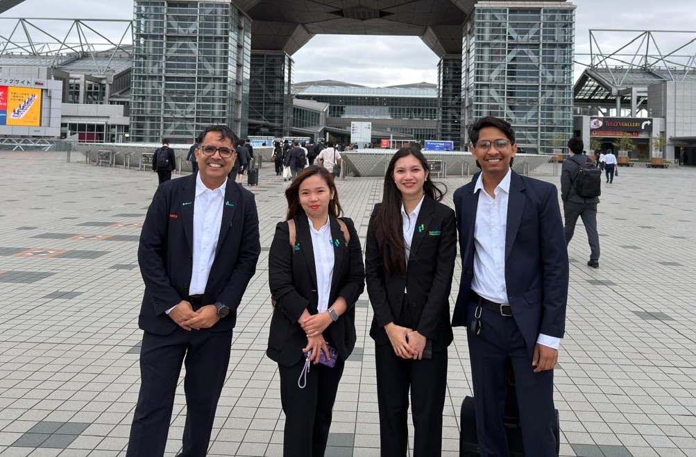 Four members of the Bishnoi Omniverse team in business dress outside the CPHI exhibition venue